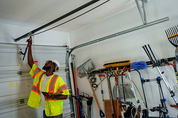 Professional Garage Door Panel Replacement technician working in Irvington, NY